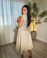 Elegante vestido sin mangas con botones decorativos®